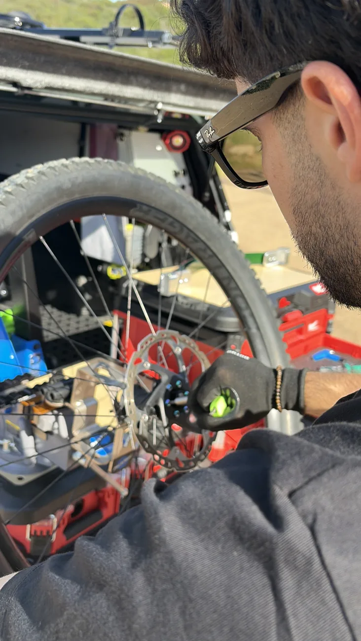 Close inspection of a wheel and disc rotor during a Silver service